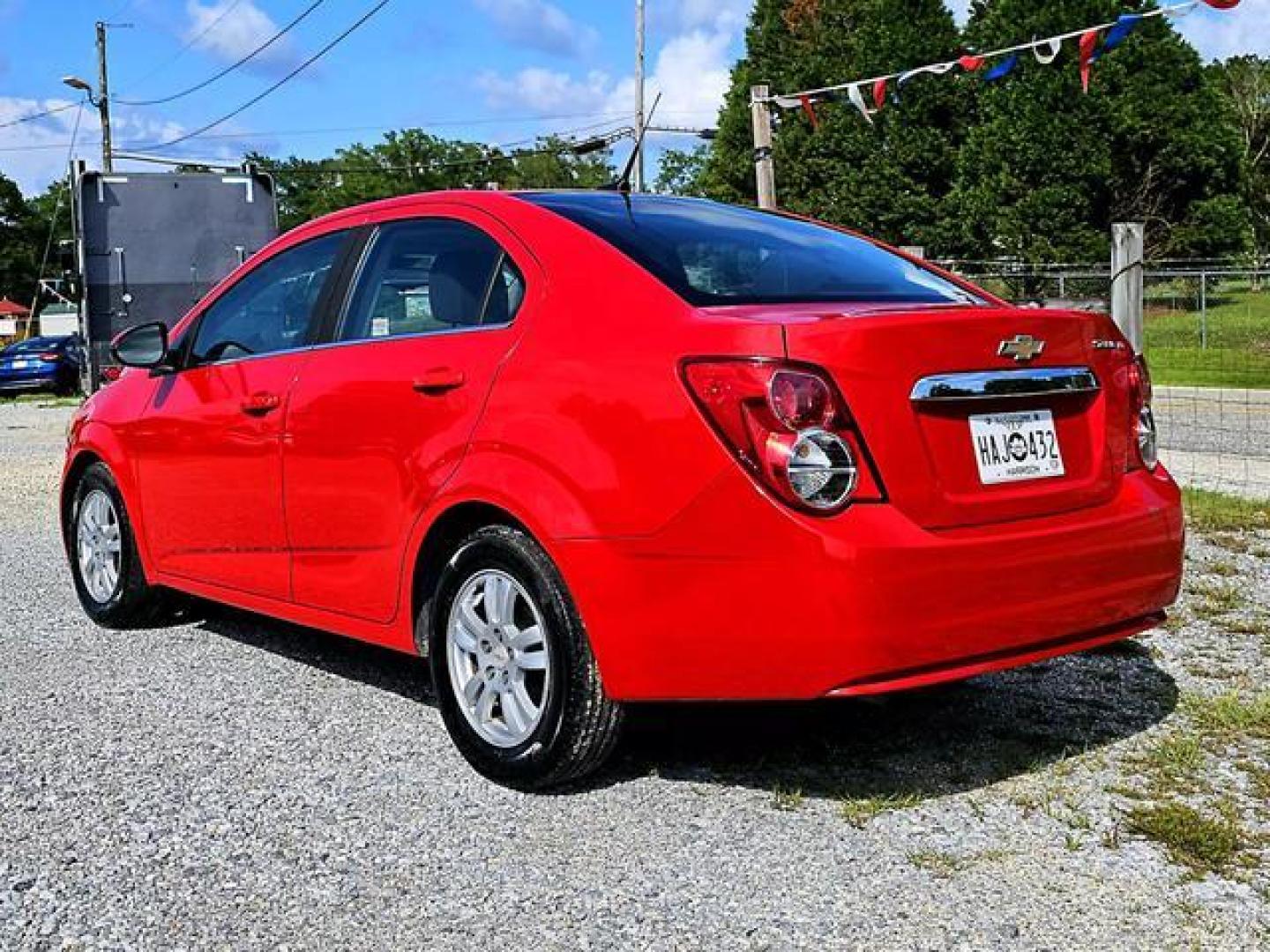 2012 Red /Grey Chevrolet Sonic LT Sedan 4D (1G1JC5SH7C4) , Automatic, 6-Spd transmission, located at 18001 Kellogg Rd, Saucier, MS, 39574, (228) 832-1441, 139.421463, -76.641457 - Photo#6