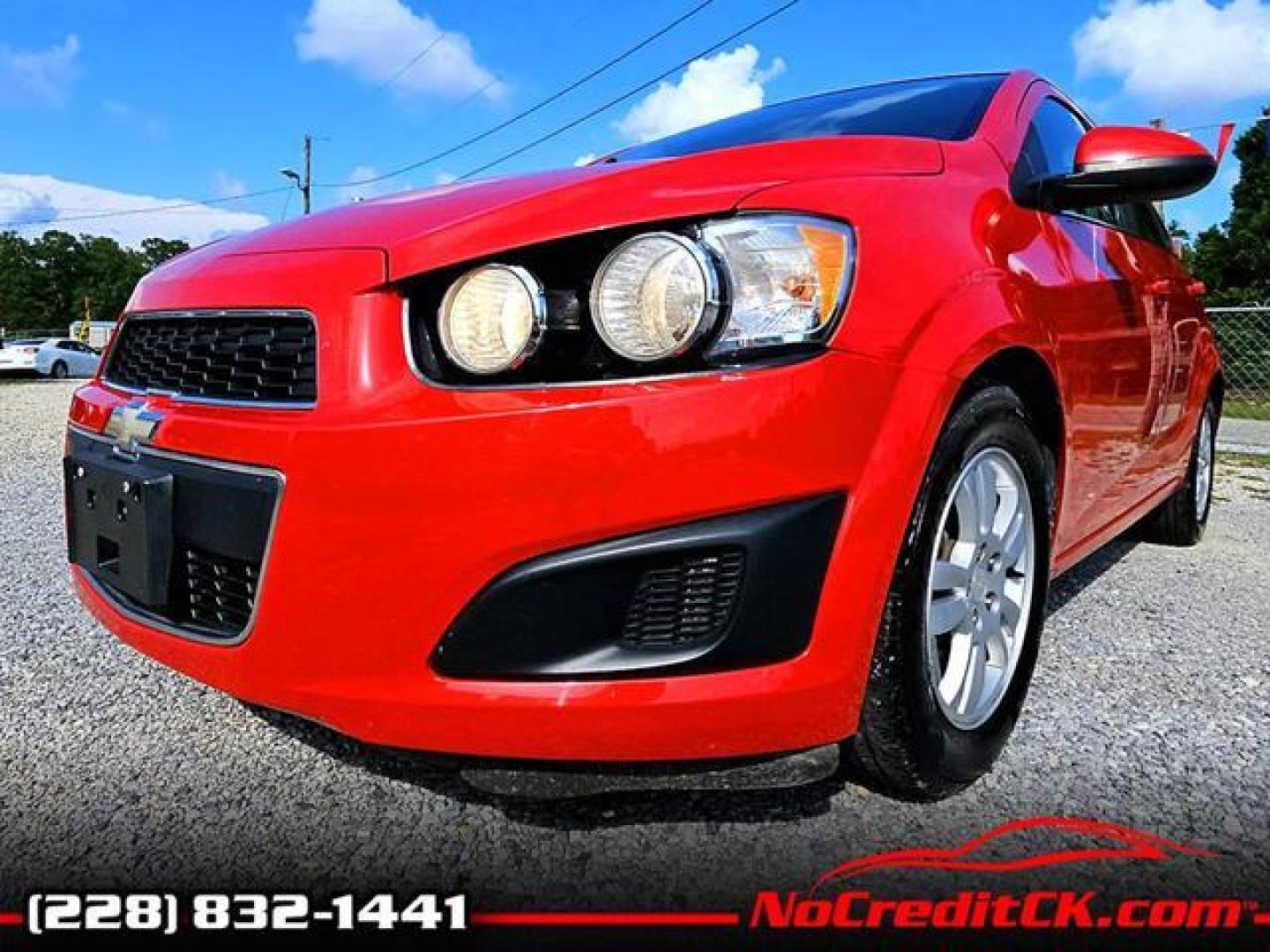 2012 Red /Grey Chevrolet Sonic LT Sedan 4D (1G1JC5SH7C4) , Automatic, 6-Spd transmission, located at 18001 Kellogg Rd, Saucier, MS, 39574, (228) 832-1441, 139.421463, -76.641457 - Photo#20