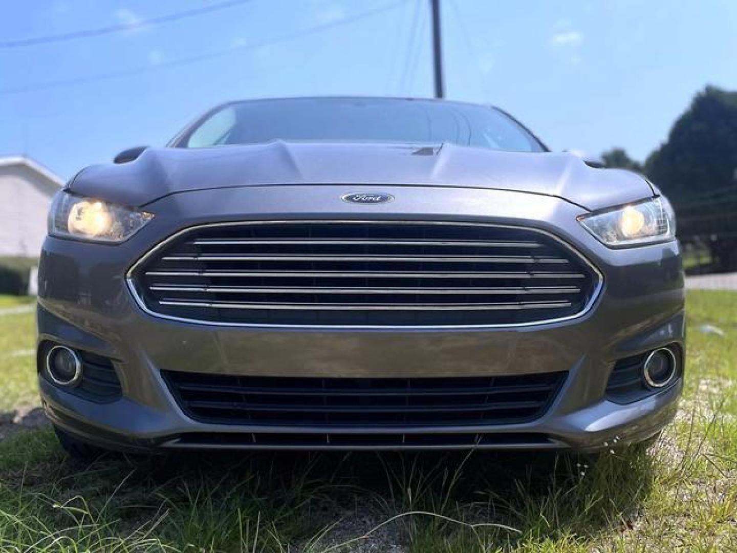 2014 Gray /Black Ford Fusion SE Sedan 4D (1FA6P0HD1E5) , Automatic, 6-Spd transmission, located at 18001 Kellogg Rd, Saucier, MS, 39574, (228) 832-1441, 139.421463, -76.641457 - '' E-Z FINANCING!! '' 2014 Ford Fusion SE Sedan 4D ~ Clean Carfax, Well Maintained, CARFAX Great Value, CARFAX APPROVED, LOW DOWN PAYMENT, SKIP YOUR FIRST PAYMENT, IRON CLAD Warranty, AND MUCH MORE !!We have ALL TYPES OF FINANCING OPTIONS! This Books out for $12,030 - Buy it today for only $10,295 ! - Photo#14