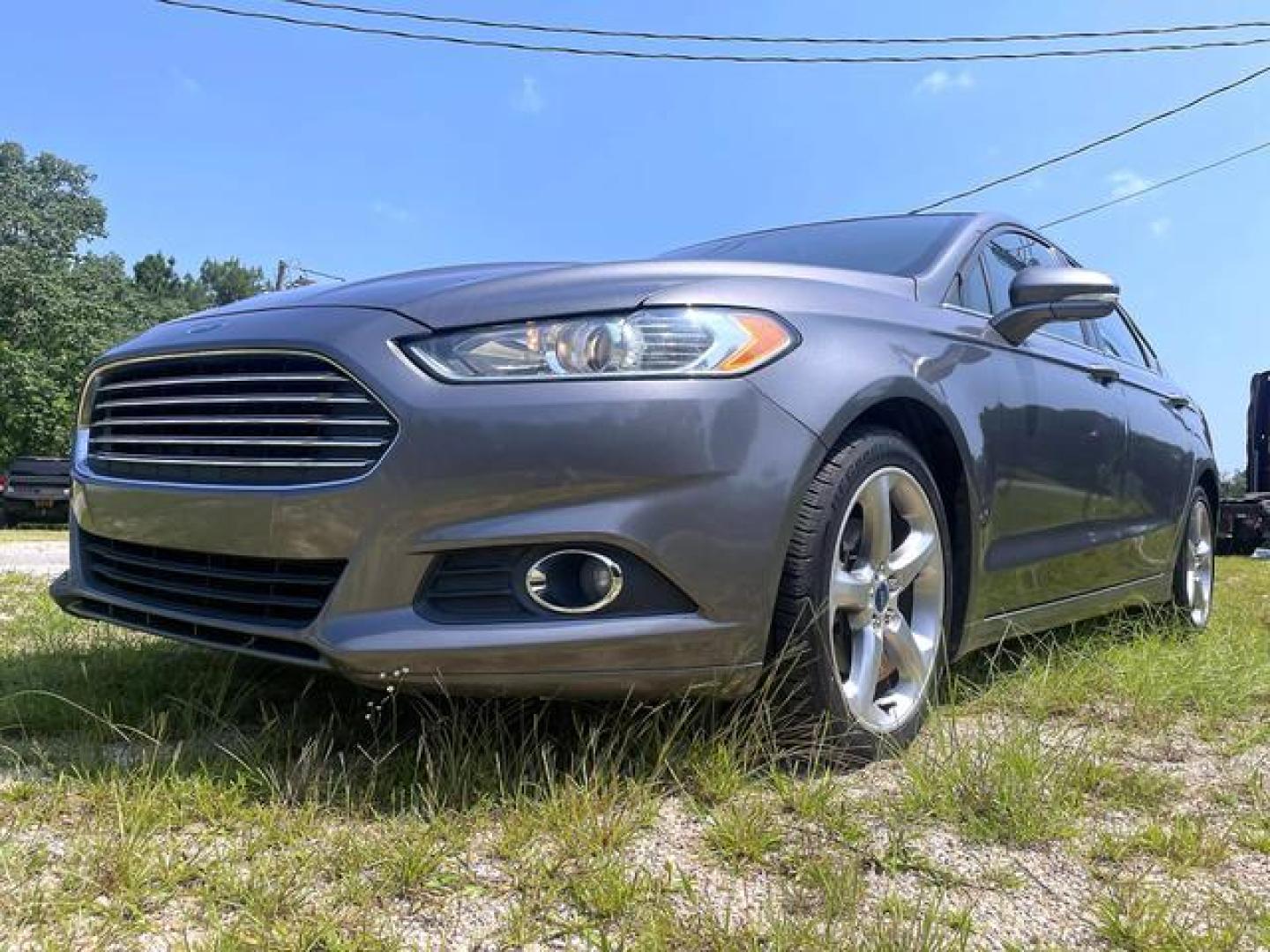 2014 Gray /Black Ford Fusion SE Sedan 4D (1FA6P0HD1E5) , Automatic, 6-Spd transmission, located at 18001 Kellogg Rd, Saucier, MS, 39574, (228) 832-1441, 139.421463, -76.641457 - '' E-Z FINANCING!! '' 2014 Ford Fusion SE Sedan 4D ~ Clean Carfax, Well Maintained, CARFAX Great Value, CARFAX APPROVED, LOW DOWN PAYMENT, SKIP YOUR FIRST PAYMENT, IRON CLAD Warranty, AND MUCH MORE !!We have ALL TYPES OF FINANCING OPTIONS! This Books out for $12,030 - Buy it today for only $10,295 ! - Photo#15