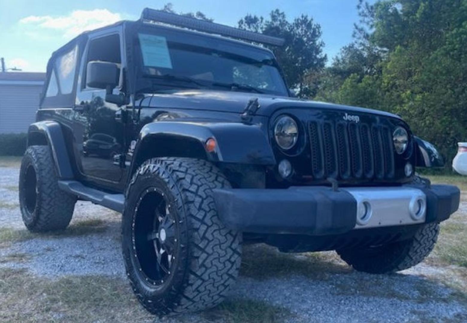 2014 BLACK MET Jeep Wrangler Sahara Sport Utility 2D (1C4AJWBG8EL) , Automatic, 5-Spd transmission, located at 18001 Kellogg Rd, Saucier, MS, 39574, (228) 832-1441, 139.421463, -76.641457 - $990. DOWN* $345. MONTHLY* E-Z FINANCING*!! 2014 Jeep Wrangler Sahara Sport Utility 2D ~ SUPER SHARP!! 1-Owners, Well Maintained, Great Value, CARFAX APPROVED, CARFAX REPORTS NO ACCIDENTS REPORTED, LOW DOWN PAYMENT, SKIP YOUR FIRST PAYMENT, IRON CLAD Warranty, AND MUCH MORE !! We have ALL TYPES OF F - Photo#4