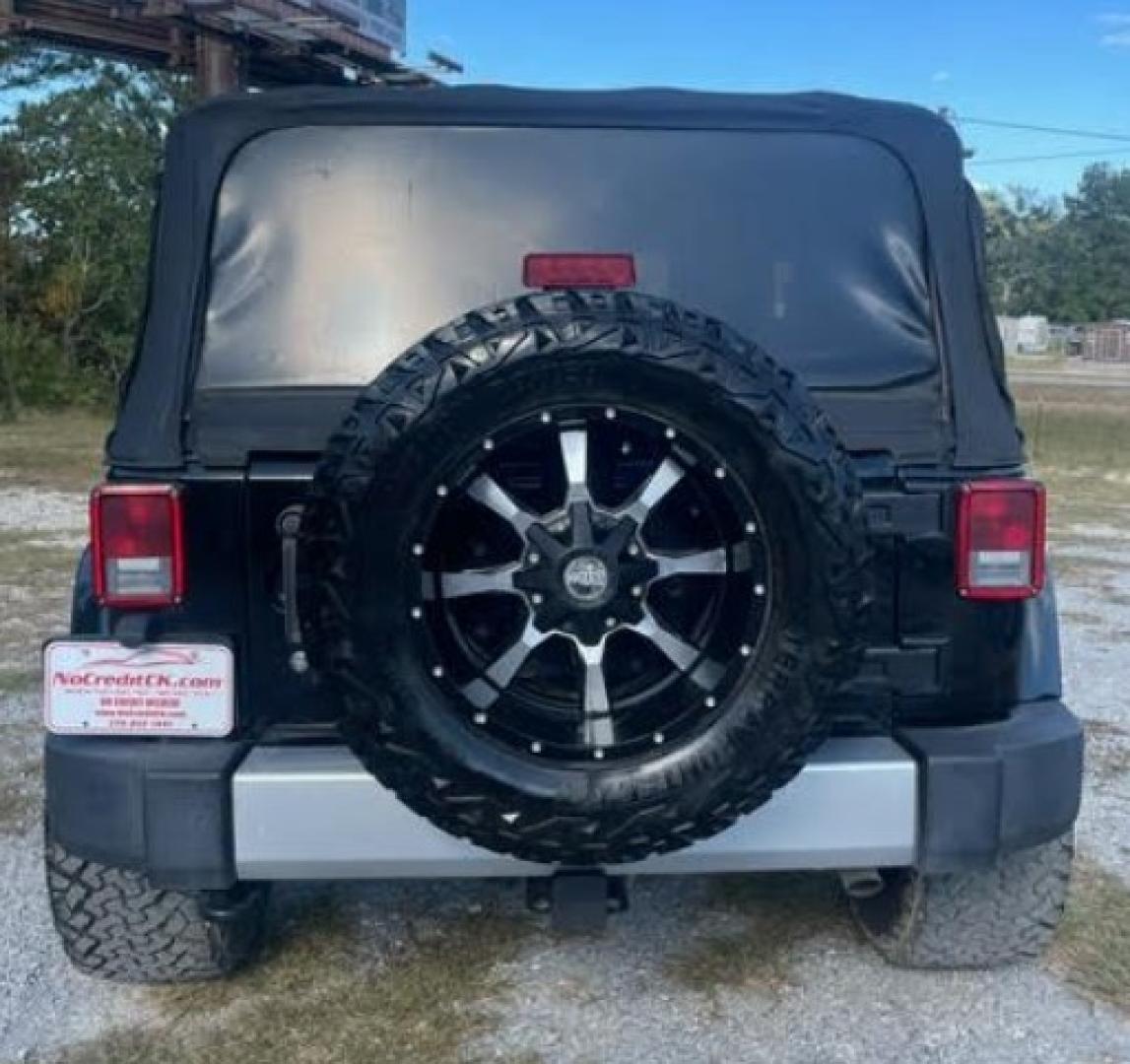 2014 BLACK MET Jeep Wrangler Sahara Sport Utility 2D (1C4AJWBG8EL) , Automatic, 5-Spd transmission, located at 18001 Kellogg Rd, Saucier, MS, 39574, (228) 832-1441, 139.421463, -76.641457 - $990. DOWN* $345. MONTHLY* E-Z FINANCING*!! 2014 Jeep Wrangler Sahara Sport Utility 2D ~ SUPER SHARP!! 1-Owners, Well Maintained, Great Value, CARFAX APPROVED, CARFAX REPORTS NO ACCIDENTS REPORTED, LOW DOWN PAYMENT, SKIP YOUR FIRST PAYMENT, IRON CLAD Warranty, AND MUCH MORE !! We have ALL TYPES OF F - Photo#5