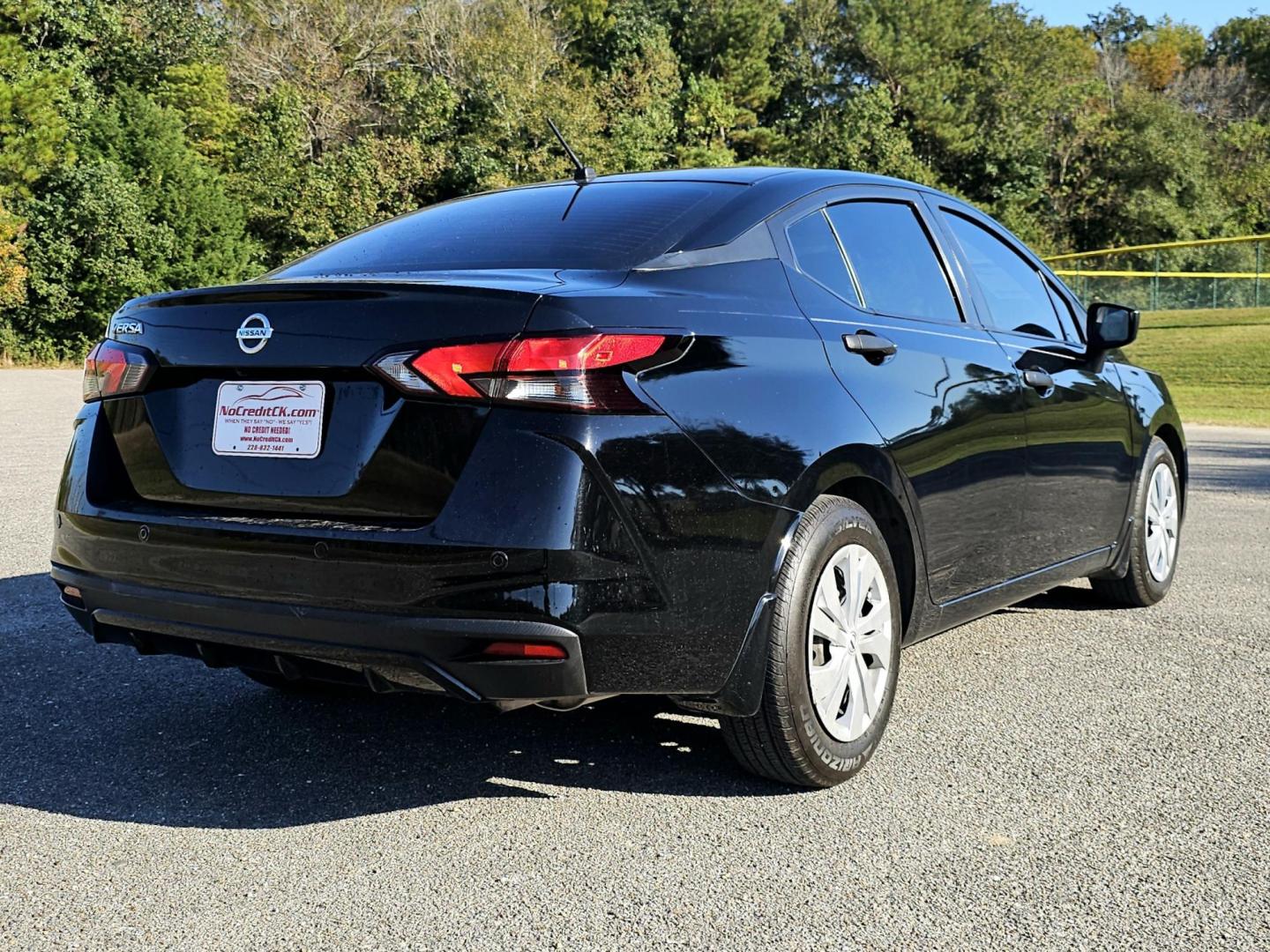 2020 Black /Black Nissan Versa S Sedan 4D (3N1CN8DV5LL) with an automatic engine, Automatic, CVT w/Xtronic transmission, located at 18001 Kellogg Rd, Saucier, MS, 39574, (228) 832-1441, 139.421463, -76.641457 - 2020 NISSAN VERSA S LIMITED NO CREDIT CHECK * NO TURN DOWN'S **Bad Credit No Problem!***No Credit No Problem***Repossession No Problem***Taxes and Tags Included*** $2,300 DOWN cash or trade* LOW MILES 52,961 *FREE 12 Months Dealer Limited Warranty Service Contract***FREE 12 Months, Dealer Oil Chan - Photo#4