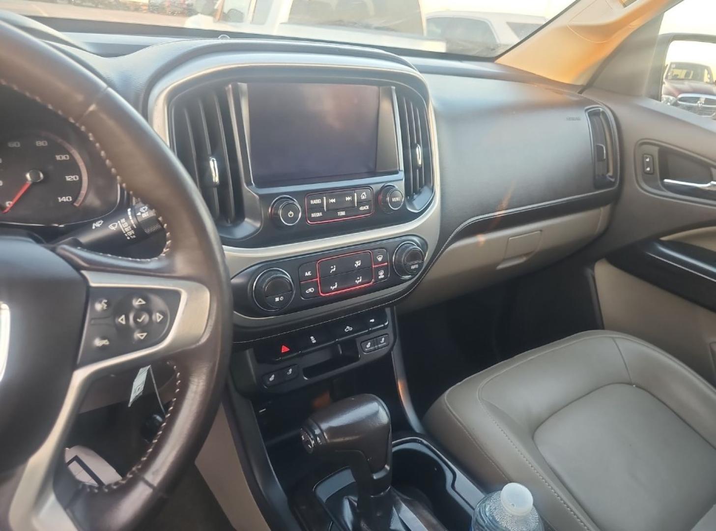 2015 BRONZE GOLD /BEIGE LEATHER GMC Canyon SLT Crew Cab 2WD Short Box (1GTG5CE37F1) with an 3.6L V6 DOHC 24V engine, 6-Speed Automatic transmission, located at 18001 Kellogg Rd, Saucier, MS, 39574, (228) 832-1441, 139.421463, -76.641457 - 2015 GMC Canyon SLE 4DOOR 2WD FUEL SAVER, EXTREMELY WELL MAINTAINED, HIGHWAY MILES, CARFAX CHECKED OUT, DEALER SERVICED, OUR SERVICE TECH HAS INSPECTED THIS CAR AND CHECKED IT OUT. GREAT EZ FAST FINANCING, BOOK VALUE $25,700. BUY IT NOW $20,989.00.. AND OUR LEANDING BANK FINANCING GETS YOU ROLLI - Photo#9