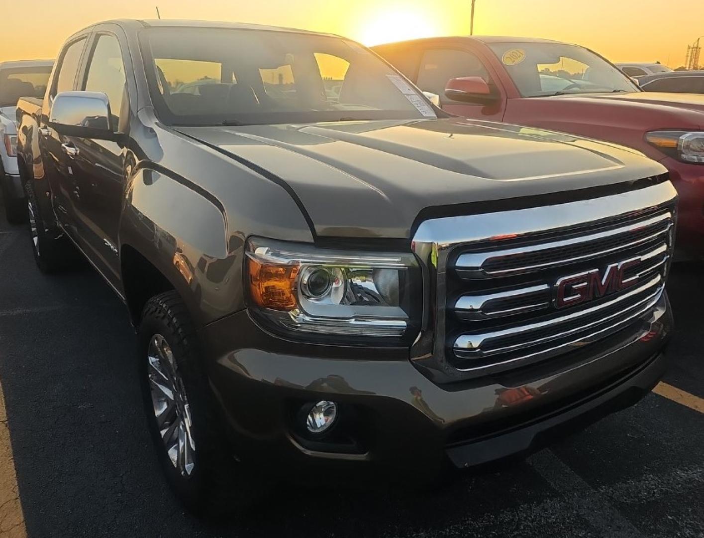 2015 BRONZE GOLD /BEIGE LEATHER GMC Canyon SLT Crew Cab 2WD Short Box (1GTG5CE37F1) with an 3.6L V6 DOHC 24V engine, 6-Speed Automatic transmission, located at 18001 Kellogg Rd, Saucier, MS, 39574, (228) 832-1441, 139.421463, -76.641457 - 2015 GMC Canyon SLE 4DOOR 2WD FUEL SAVER, EXTREMELY WELL MAINTAINED, HIGHWAY MILES, CARFAX CHECKED OUT, DEALER SERVICED, OUR SERVICE TECH HAS INSPECTED THIS CAR AND CHECKED IT OUT. GREAT EZ FAST FINANCING, BOOK VALUE $25,700. BUY IT NOW $20,989.00.. AND OUR LEANDING BANK FINANCING GETS YOU ROLLI - Photo#0