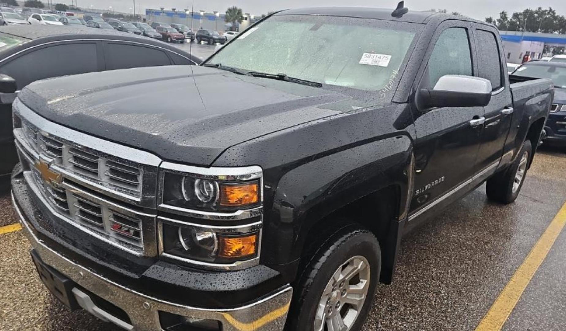 2015 Black /GREY Chevrolet Silverado 1500 LTZ Double Cab Short Box 4WD (1GCVKSEC9FZ) with an 5.3L V8 OHV 16V engine, 6-Speed Automatic transmission, located at 18001 Kellogg Rd, Saucier, MS, 39574, (228) 832-1441, 139.421463, -76.641457 - Photo#4