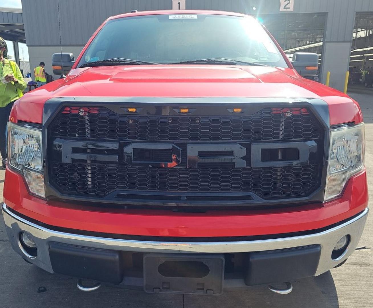 2011 Red Ford F-150 FX4 SuperCab 6.5-ft. Bed 4WD (1FTFX1EF4BF) with an 5.0L V8 engine, 4-Speed Automatic transmission, located at 18001 Kellogg Rd, Saucier, MS, 39574, (228) 832-1441, 139.421463, -76.641457 - 2011 Ford F-150 XLT, 4X4WD, V8,WE HAVE THE BEST AUTO FINANCING IN AMERICA HERE BLACK CUSTOM GRILL, BLACK CUSTOM MAG WHEELS, CHROME PACKAGE, Towing Package, Spare Tire, Keyless Entry, Fog Lights, Trailer Hitch, Trailer Wiring, Super Cab, Bed Liner, and Front Bench Seat, Bluetooth Connection, Chrom - Photo#0