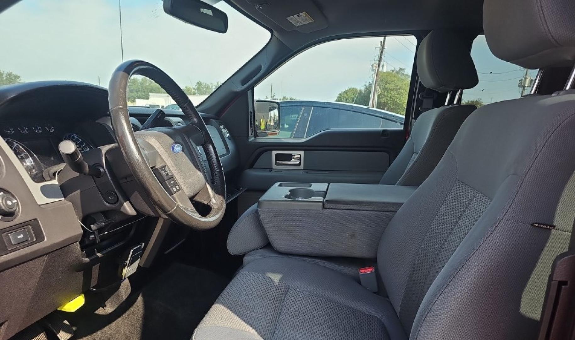 2011 Red Ford F-150 FX4 SuperCab 6.5-ft. Bed 4WD (1FTFX1EF4BF) with an 5.0L V8 engine, 4-Speed Automatic transmission, located at 18001 Kellogg Rd, Saucier, MS, 39574, (228) 832-1441, 139.421463, -76.641457 - 2011 Ford F-150 XLT, 4X4WD, V8,WE HAVE THE BEST AUTO FINANCING IN AMERICA HERE BLACK CUSTOM GRILL, BLACK CUSTOM MAG WHEELS, CHROME PACKAGE, Towing Package, Spare Tire, Keyless Entry, Fog Lights, Trailer Hitch, Trailer Wiring, Super Cab, Bed Liner, and Front Bench Seat, Bluetooth Connection, Chrom - Photo#8