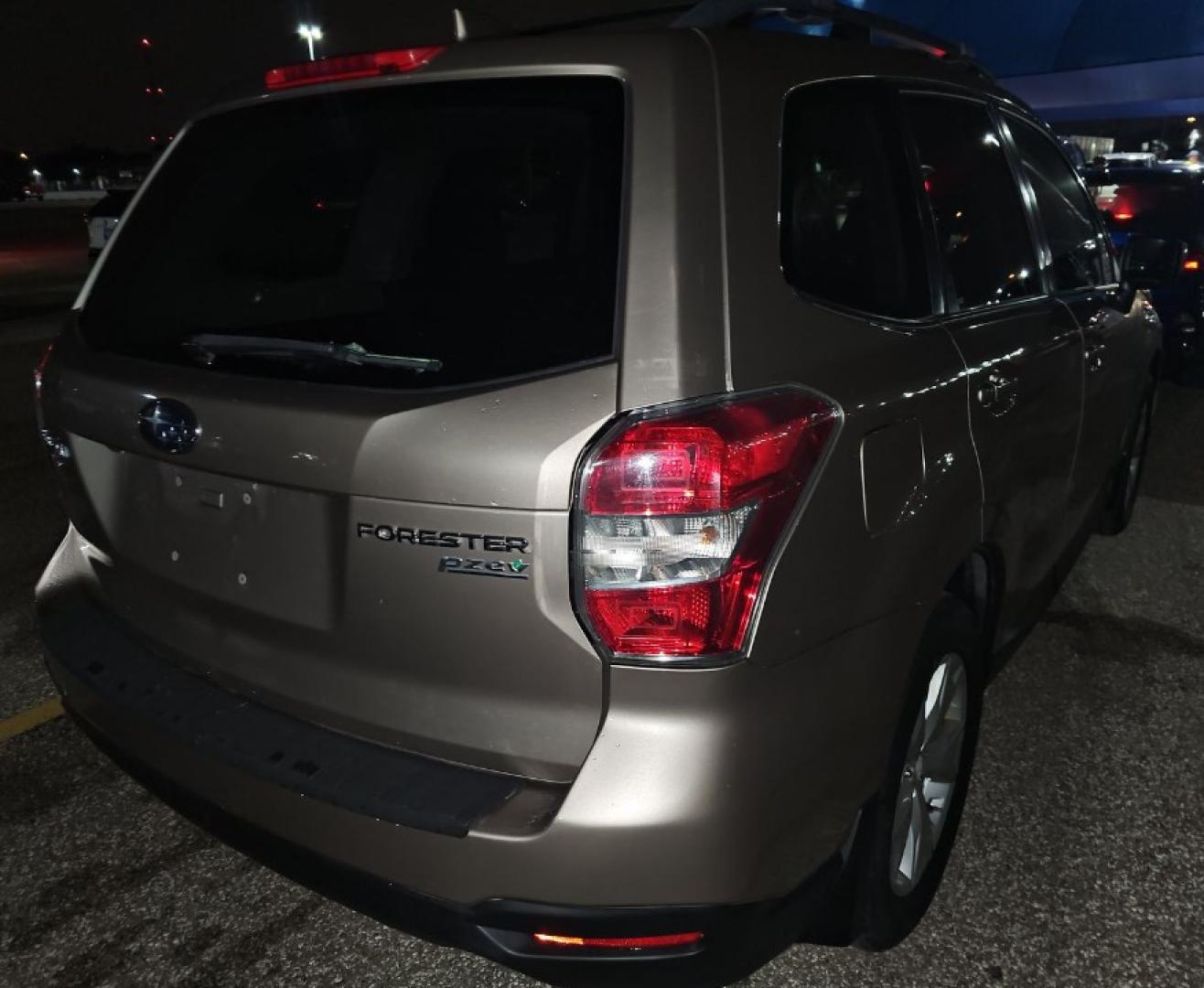 2016 MET GOLD /GRAY DK Subaru Forester 2.5i Premium PZEV CVT (JF2SJADC4GG) with an 2.5L H4 SOHC 16V engine, CVT transmission, located at 18001 Kellogg Rd, Saucier, MS, 39574, (228) 832-1441, 139.421463, -76.641457 - 2016 Subaru Forester 1 OWNER CAR, All-Wheel Drive, All Weather Package, Keyless Entry, Heated Seats, Roof Rails, Bucket Seats, Alloy Wheels, Splash Guards, 17 Inch Wheels, Heated Mirrors, and Satellite Radio. ALL HWY MILES SUPER CLEAN EXTREMELY WELL MAINTAINED, HIGHWAY MILES, CARFAX CHECKED OUT, - Photo#1