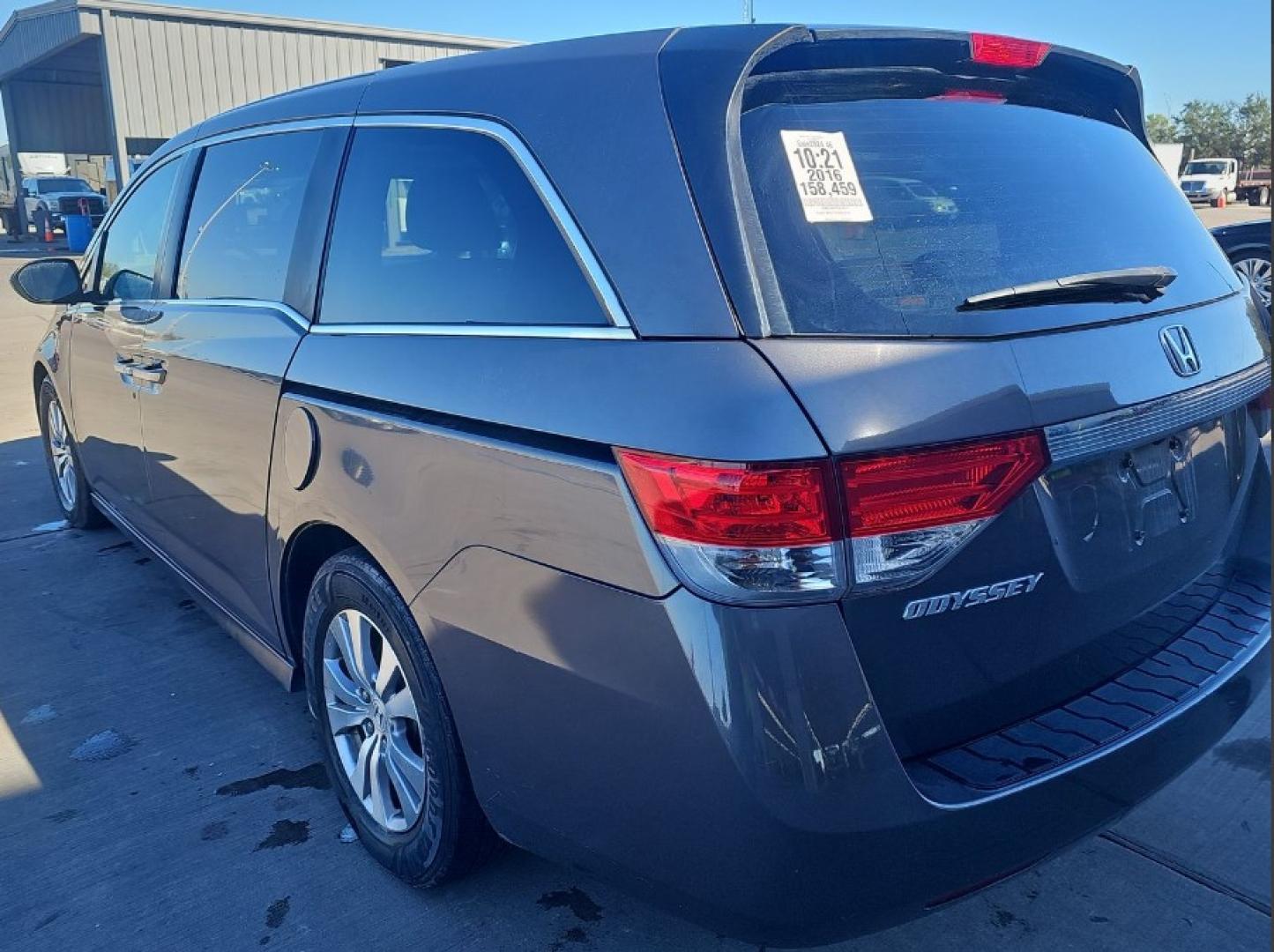 2016 Gray Honda Odyssey EX-L (5FNRL5H65GB) with an 3.5L V6 SOHC 24V engine, 6A transmission, located at 18001 Kellogg Rd, Saucier, MS, 39574, (228) 832-1441, 139.421463, -76.641457 - 2016 Honda Odyssey SE Front-Wheel Drive, Keyless Entry, Passenger Van, Alloy Wheels, Satellite Radio, Side Airbags, Power Sliding Doors, Hondalink, and Keyless Ignition, ALL HWY MILES SUPER CLEAN EXTREMELY WELL MAINTAINED, HIGHWAY MILES, DEALER SERVICED, OUR SERVICE TECH HAS INSPECTED THIS CAR - Photo#5