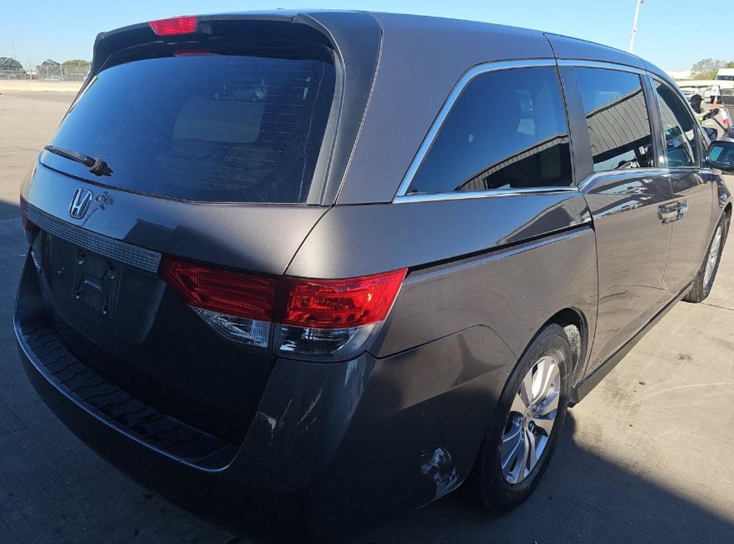 2016 Gray Honda Odyssey EX-L (5FNRL5H65GB) with an 3.5L V6 SOHC 24V engine, 6A transmission, located at 18001 Kellogg Rd, Saucier, MS, 39574, (228) 832-1441, 139.421463, -76.641457 - 2016 Honda Odyssey SE Front-Wheel Drive, Keyless Entry, Passenger Van, Alloy Wheels, Satellite Radio, Side Airbags, Power Sliding Doors, Hondalink, and Keyless Ignition, ALL HWY MILES SUPER CLEAN EXTREMELY WELL MAINTAINED, HIGHWAY MILES, DEALER SERVICED, OUR SERVICE TECH HAS INSPECTED THIS CAR - Photo#4