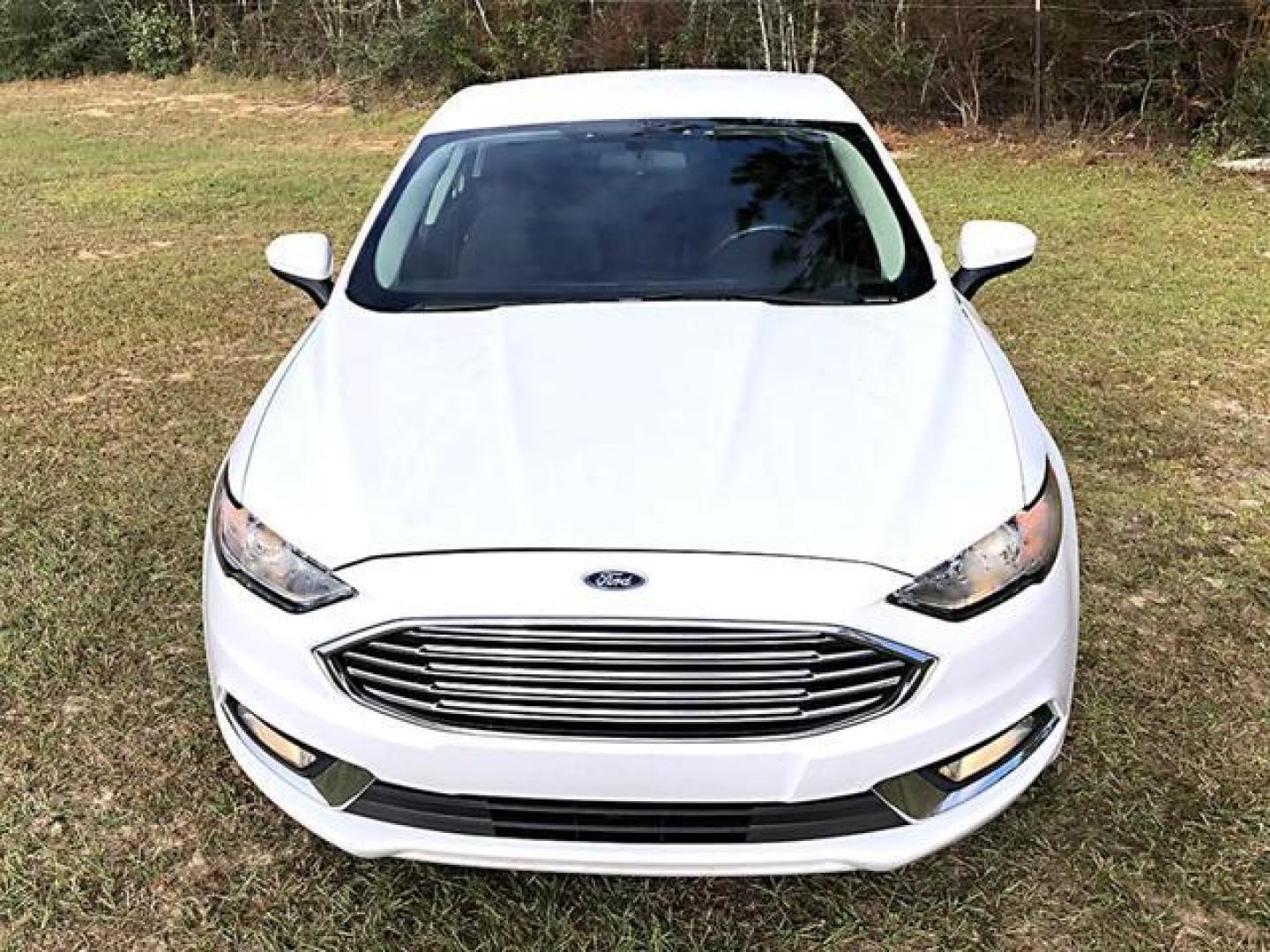 2017 White /Black Ford Fusion S Sedan 4D (3FA6P0G74HR) with an 2.5L L4 DOHC 16V engine, Auto, 6-Spd SelectShift transmission, located at 18001 Kellogg Rd, Saucier, MS, 39574, (228) 832-1441, 139.421463, -76.641457 - Photo#3