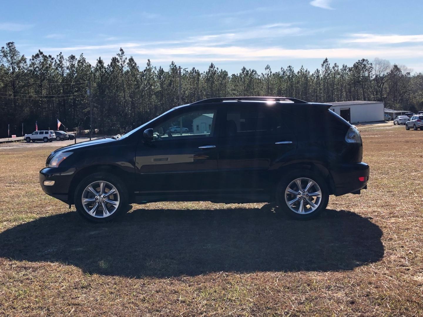 2009 Black Lexus RX 350 FWD (2T2GK31U99C) with an 3.5L V6 DOHC 24V engine, 5-Speed Automatic Overdrive transmission, located at 18001 Kellogg Rd, Saucier, MS, 39574, (228) 832-1441, 39.421459, -76.641457 - Photo#2